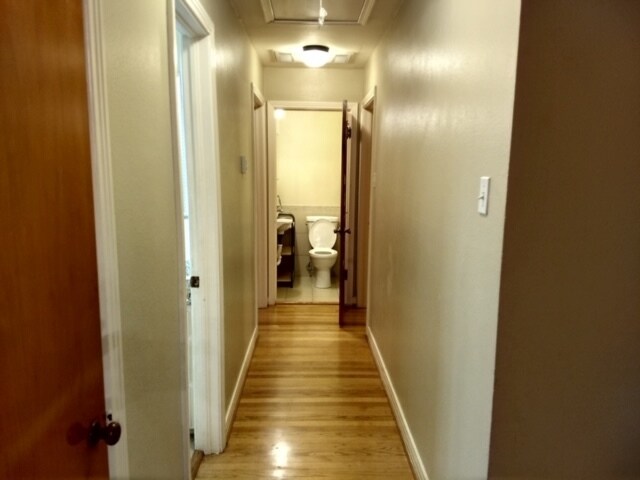 Hallway with half bath - 201 North Mills Street