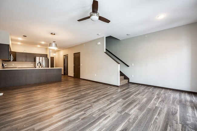 Building Photo - Spacious Townhome with Heated Garage Just ...