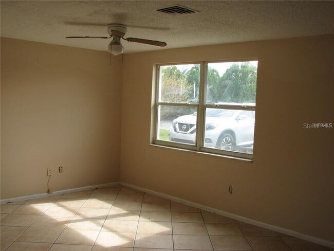Building Photo - 9831 Lamantin Dr