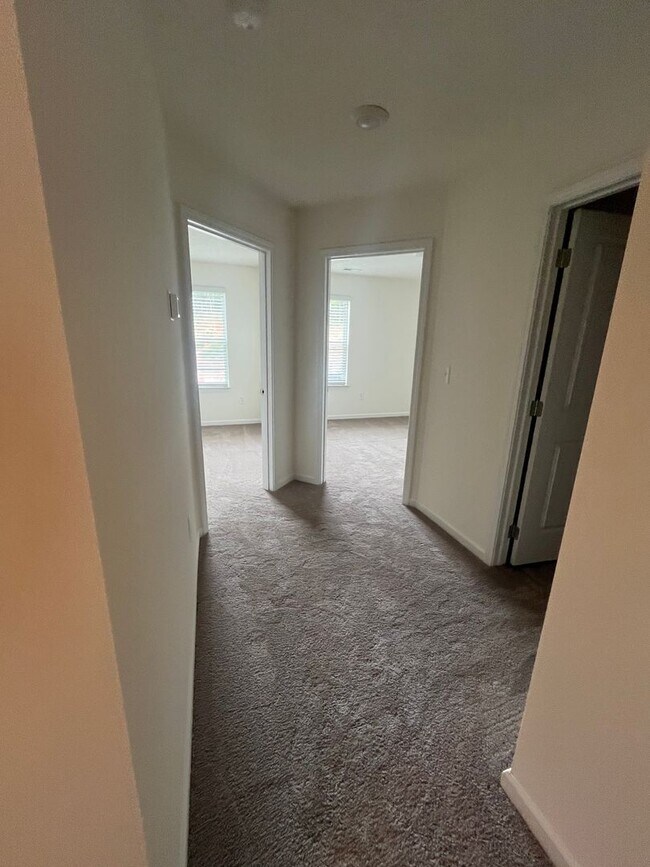 Building Photo - Brand New Townhome – Modern Comfort & Conv...