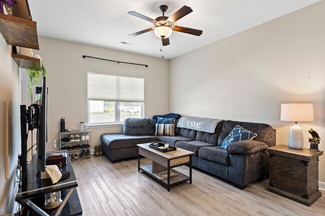 Building Photo - Available Now! Enjoy low-maintenance coastal living in this beautiful 2-bedroom, 2.5-bath townhom...
