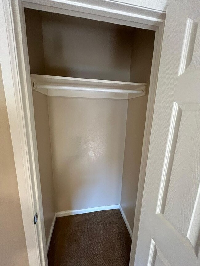 Building Photo - 2 Bedroom 1.5 Bath Townhome. Gated Community. Upgraded & 2 Parking Spaces