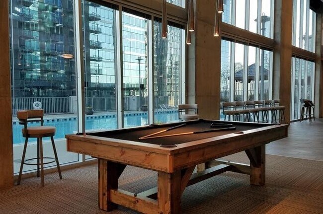 Building Photo - Stunning condo in the heart of SoBro at the Encore! Beautiful 1 bed, 1 bath on the amenity floor ...