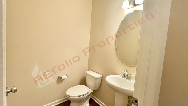 Building Photo - 3 Story Townhome 3 Bedrooms Rear Entry 2 Car Attached Garage with 1st Floor Bedroom, Community Po...