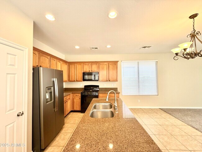 Building Photo - 14587 W Acapulco Ln
