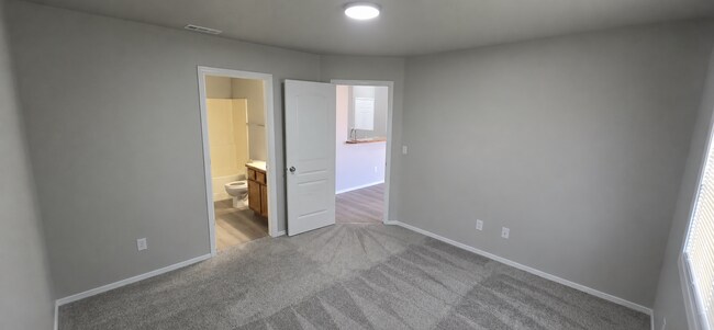 Building Photo - This three bedroom, 2 bath, single level home is ready for you! New paint, vinyl plank flooring, ...