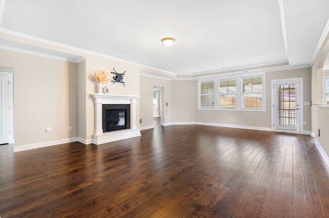 Building Photo - Luxurious 4-Bedroom Retreat with Third Floor Bonus Room & Fenced-in Backyard