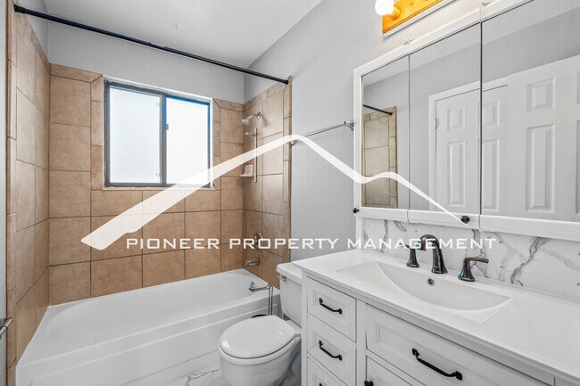 Building Photo - Spacious Split-Level Home in D20 with Mountain Views, 2 Car Garage, Fenced Yard and AC!