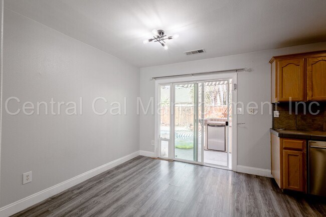 Building Photo - 3 Bedroom/2 Bath with a Pool and Solar - $...