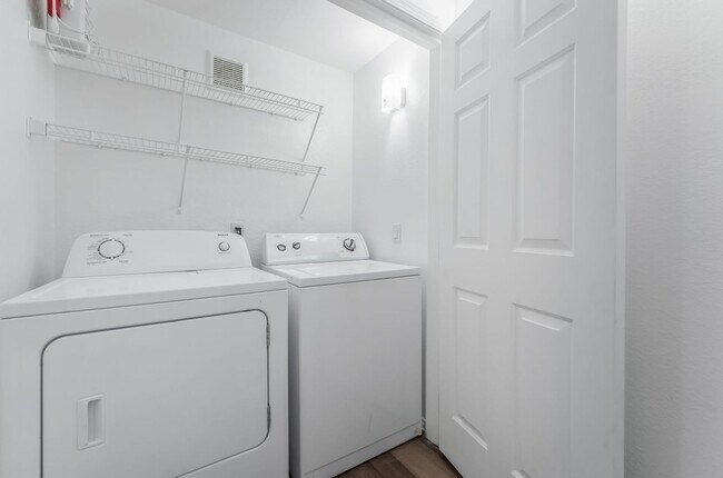 Building Photo - Modern Gated Condo with Stylish Upgrades, Poolside Location & Private Balcony!