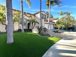 Building Photo - Room for Everyone: Meticulously Maintained 5-Bedroom Estate