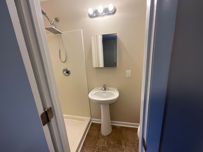 Building Photo - Reduced to $1550/mo! N Central Greensboro location, 3/2 brick home with lots of shade, fresh paint!