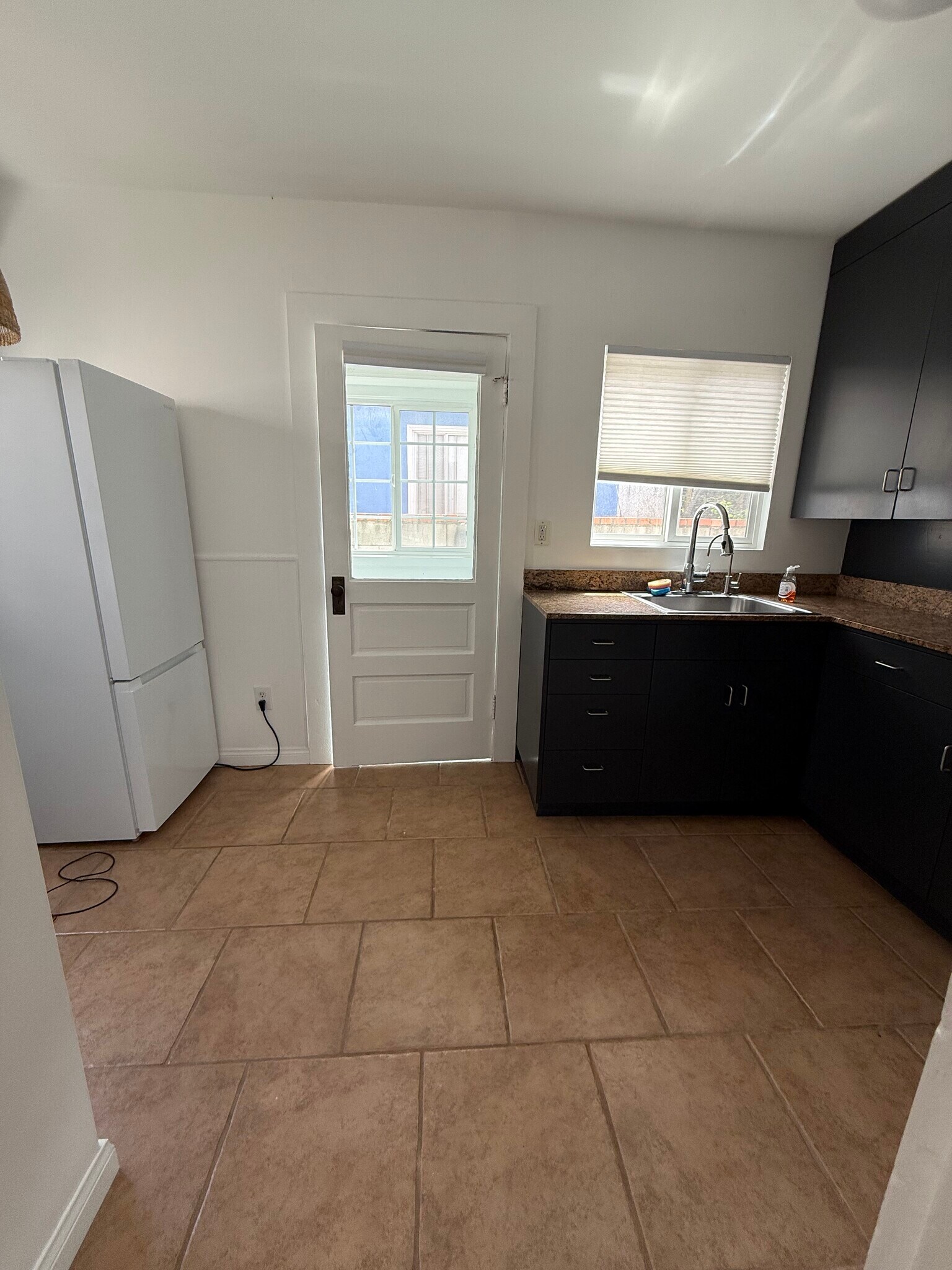 Fridge can move to Water heater / Storage Room - 4241 Lincoln Ave