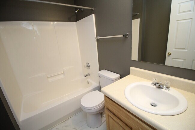 Building Photo - Don’t Miss This Milton Duplex — 2BR/2BA Brick Home with Garage, Walk-In Closet, Open Living Space...