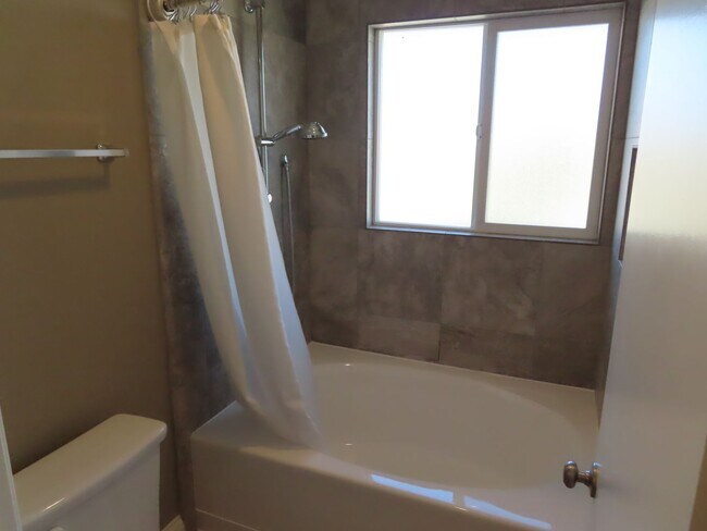 Building Photo - Renovated Three Bedroom Home