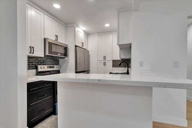 Building Photo - 8650 Gulana Ave