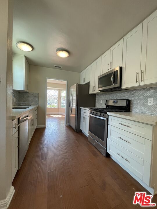 Building Photo - 5048 Enfield Ave