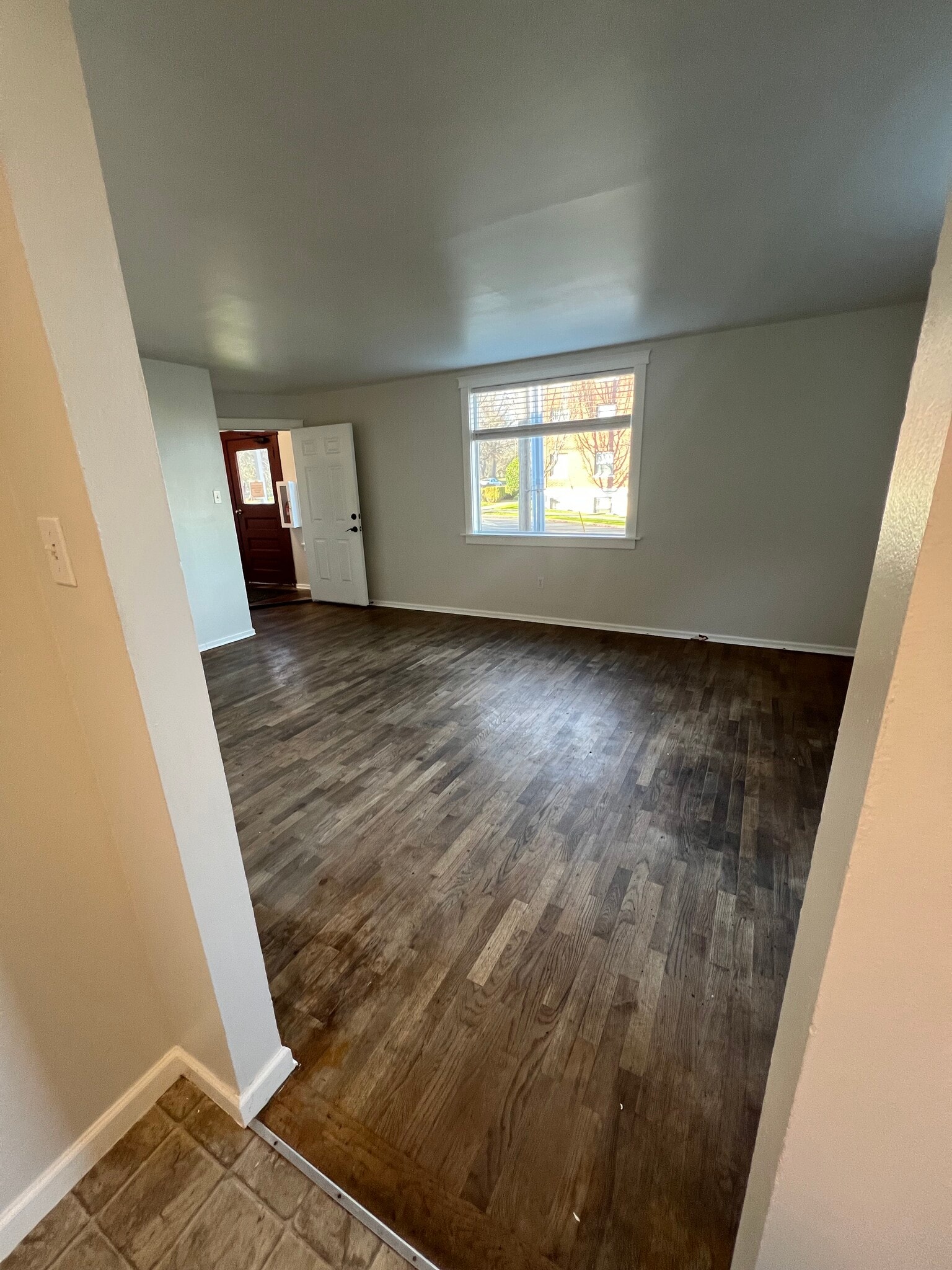 View of living room from kitchen. - 620 6th Ave