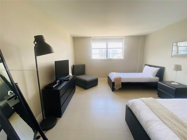 Spacious Bedroom - 19370 Collins Ave