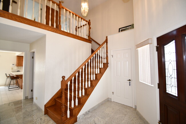 Staircase takes you to landing space for possible home office. - 1920 Havemeyer Ln