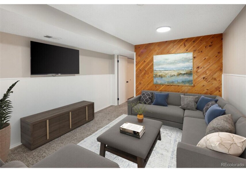 Downstairs family room - 10587 W Maplewood Dr