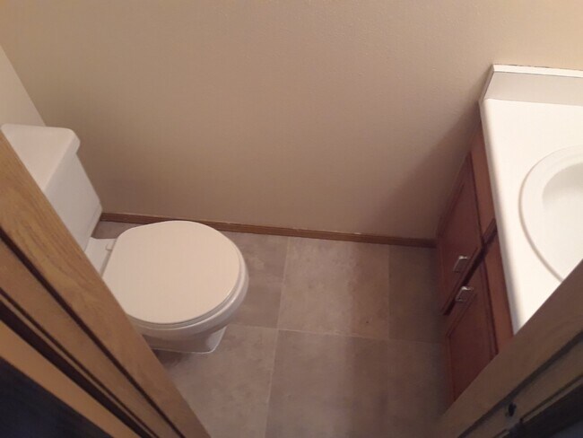 Building Photo - Available Now! "Charming 2-Bed Townhouse with Fireplace Oasis on South Trenton Street!"