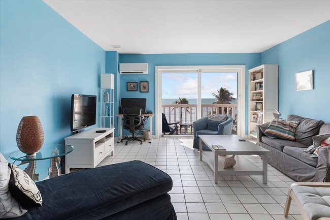 Building Photo - Wake Up to Ocean Views – Fully Furnished 2BR/1BA Condo Available for 1-Year Lease!