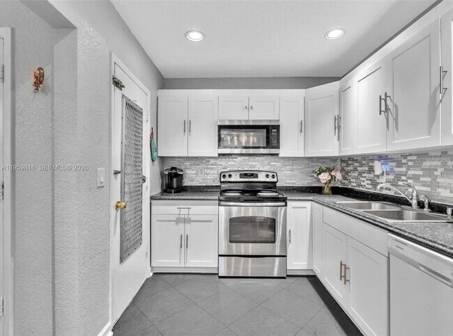 Building Photo - 4731 NW 10th Ct