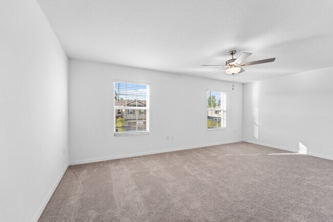 Building Photo - Absolutely stunning 3 BR /2.5 Bath / 2 Car Garage + LOFT townhome in ultra-modern and green-focus...