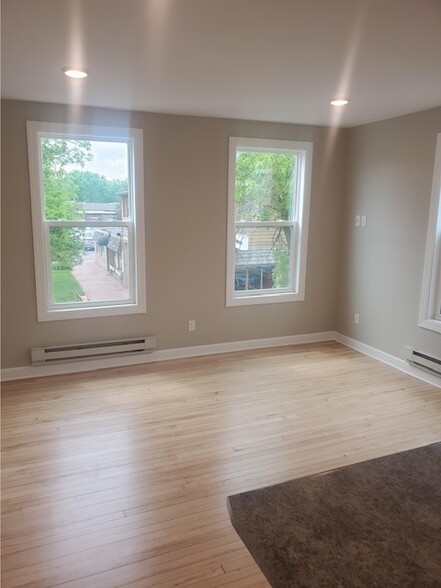 Large bedrooms with original hardwood floors - 2197 4th St