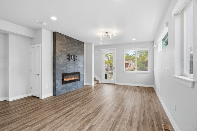 Building Photo - $3,940.95 - 3 Bed, 2.5 Bath Townhome In Denver with Central AC and Outdoor Space!