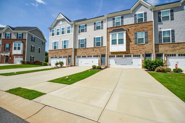 Building Photo - 3 Bedrooms | 2.5 Bathrooms | Lower-Level Flex Room | Approximately 1,978 Square Feet | 2-Car Gara...