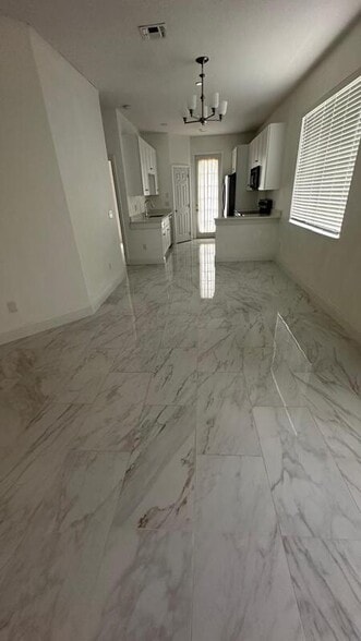 Building Photo - 9189 Camden Gardens St