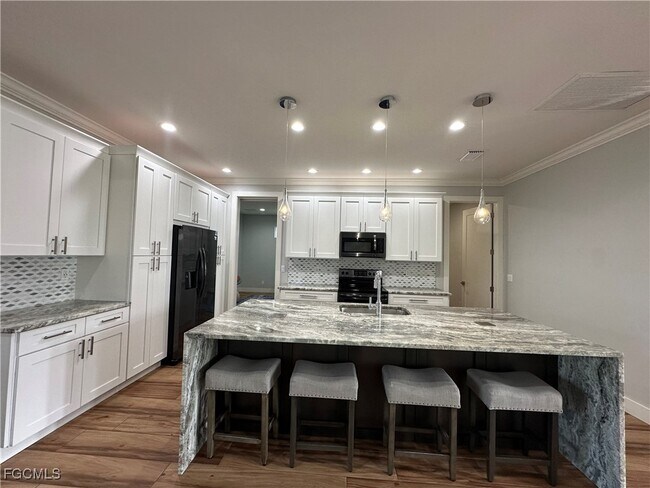 Building Photo - 4402 Chiquita Blvd S