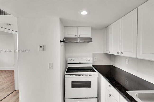 Building Photo - 4335 NW S Tamiami Canal Dr