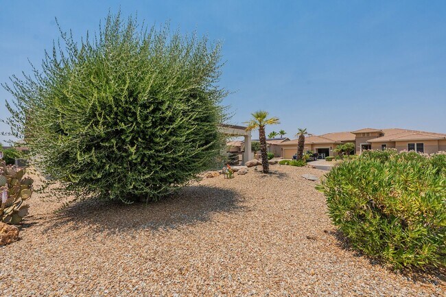 Building Photo - STUNNING Home with New AC in Exclusive 'Th...