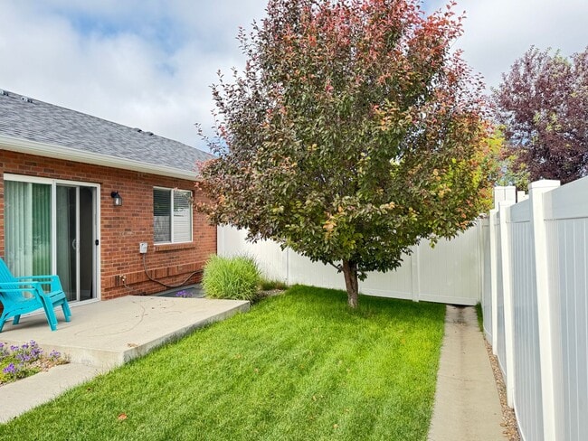 Building Photo - 4 BEDROOM, 3 BATHROOM TWINHOME WITH 2 CAR ATTACHED GARAGE IN NORTH CHEYENNE