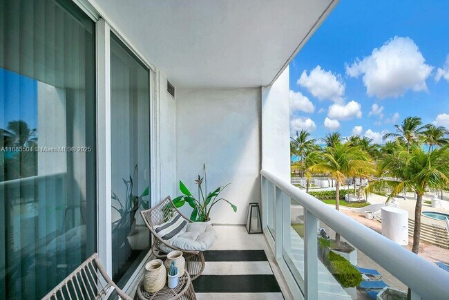 Building Photo - 10275 Collins Ave
