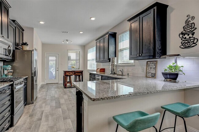 Building Photo - 3 Bed rooms and 2 baths, large master closet. Vinyl garage floor coating is just one of the many ...