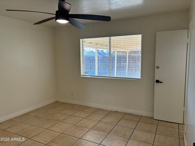 Building Photo - 8819 W Roma Ave