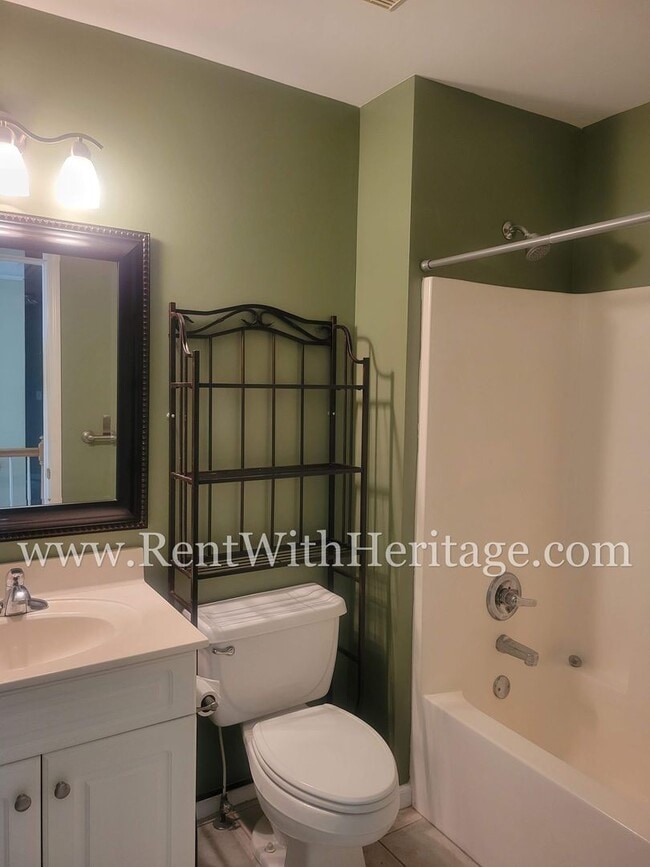 Building Photo - Gorgeous 3-Story Brick Home / 2 Fireplaces / Full Finished Basement / Chapel Hill Schools