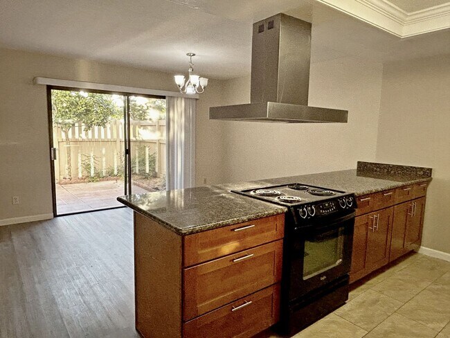 Building Photo - Bright and quiet two-story townhouse situated in the friendly Sunset Oaks community with an award...