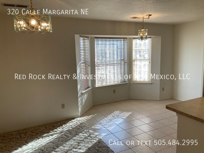 Building Photo - 320 Cll Margarita NE