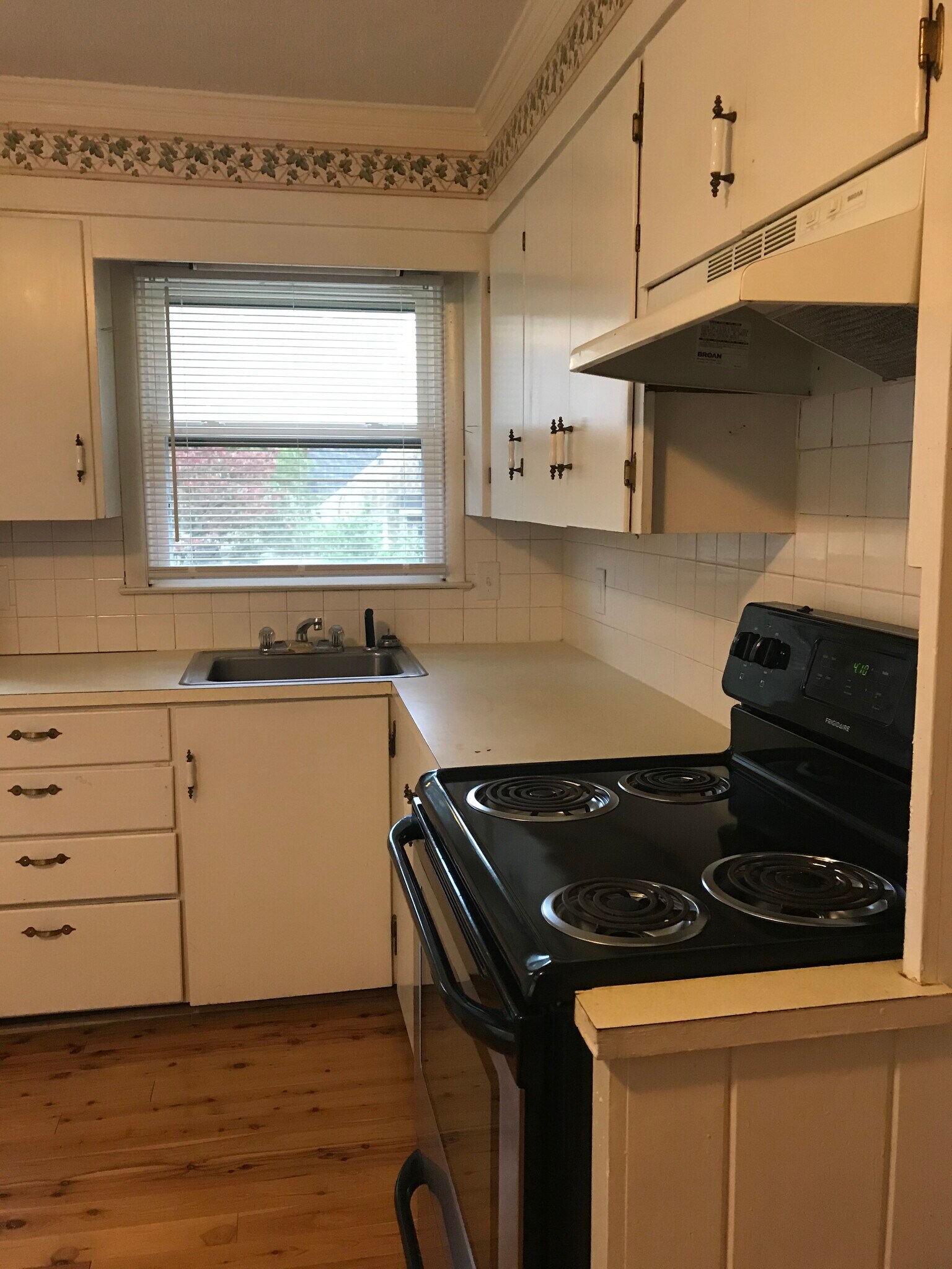 Kitchen View of Stove, Countertops, and sink - 6051 Tobaccoville Rd