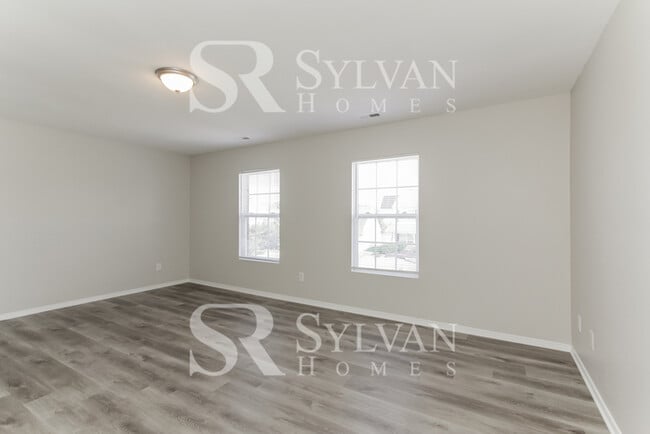 Building Photo - Enjoy living the good life in this 4 bedro...
