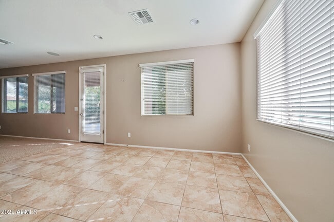 Building Photo - 8767 W Fleetwood Ln