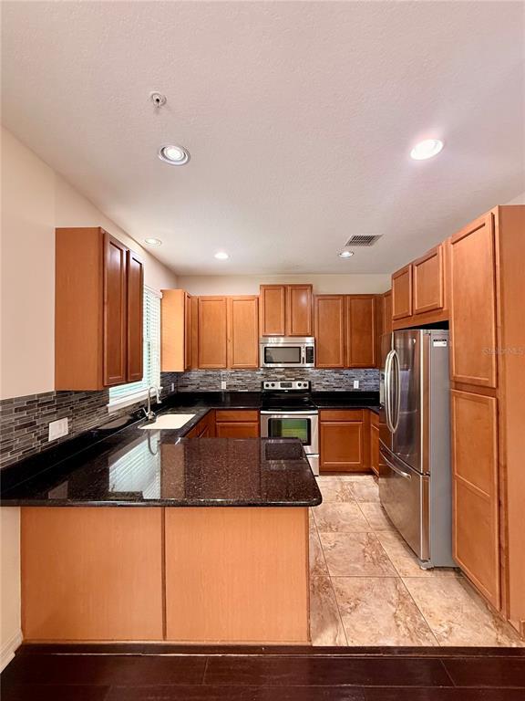 Building Photo - 9412 Strongbark Ln