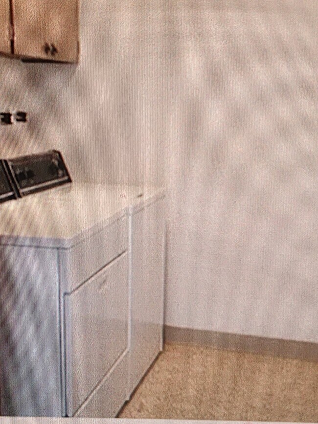 Laundry room upstairs - 50 NE Village Squire Ave