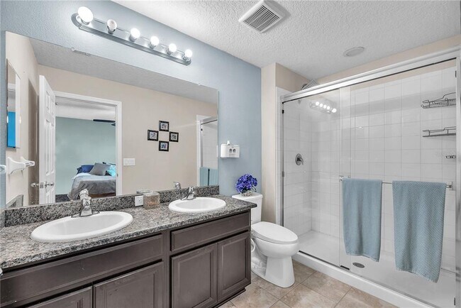 Building Photo - 7085 Woodchase Glen Dr