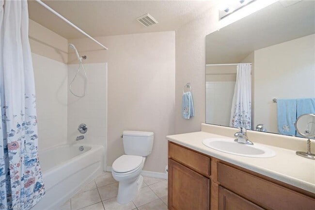 Building Photo - Gardens at Beachwalk - Unit 111